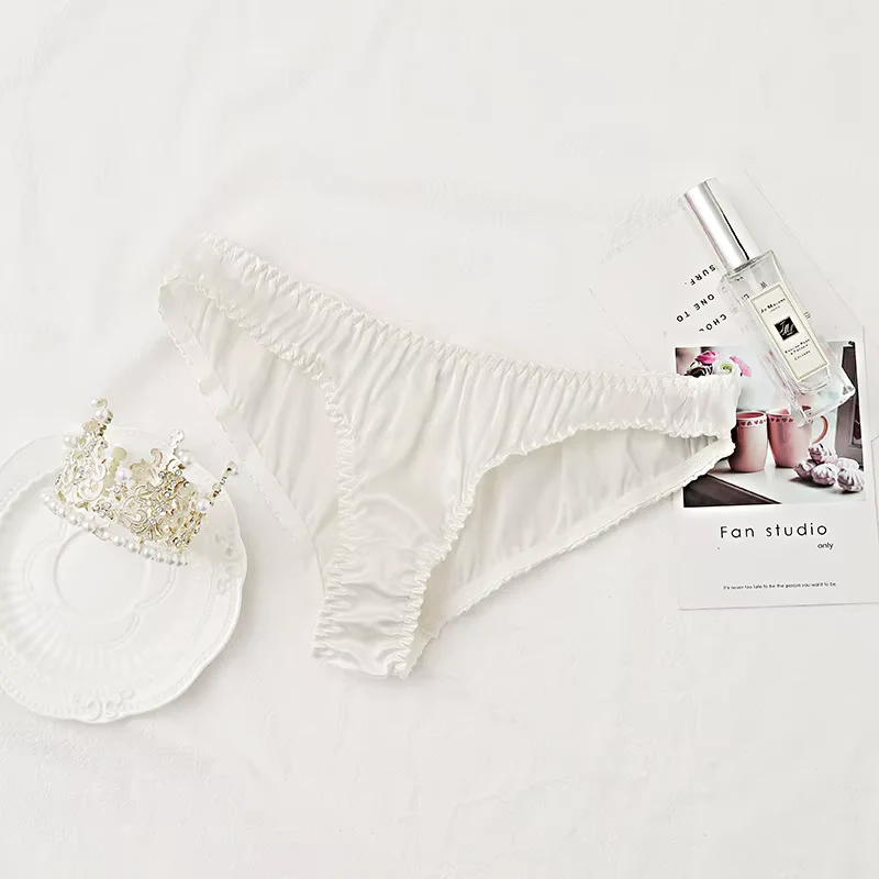 Weißer Seiden-Tanga mit niedrigem Bund, sexy Unterwäsche