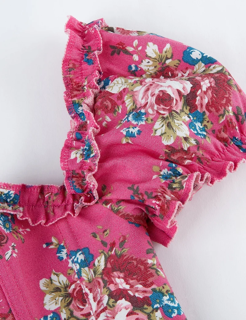 Rosa bedrucktes Korsett mit Puffärmeln und Herzbustier