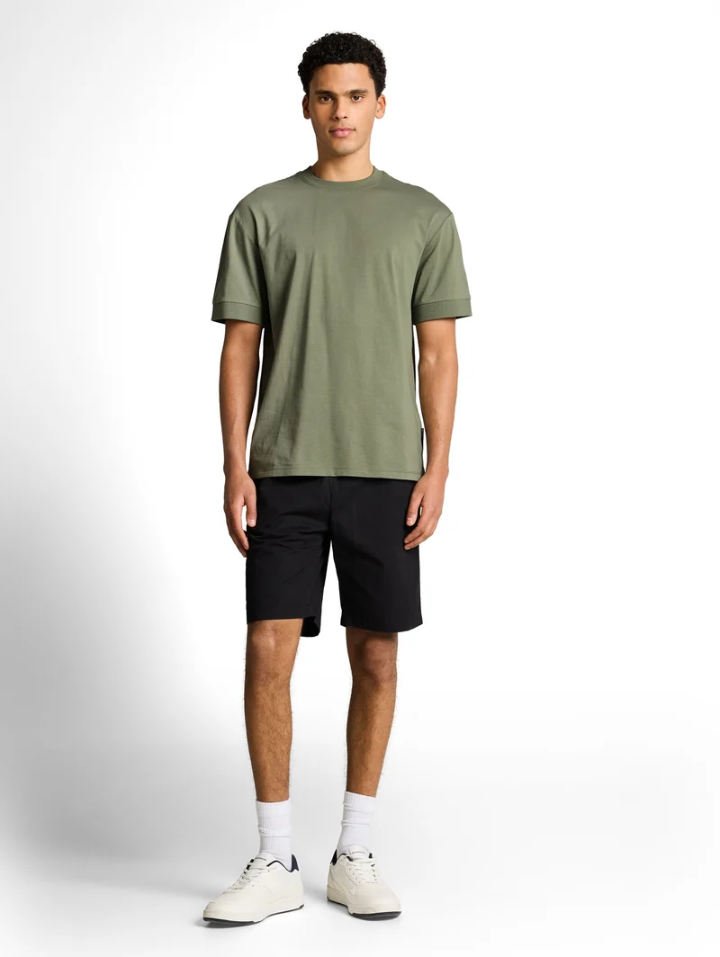 Relaxed Fit T-Shirt mit Rippbündchen