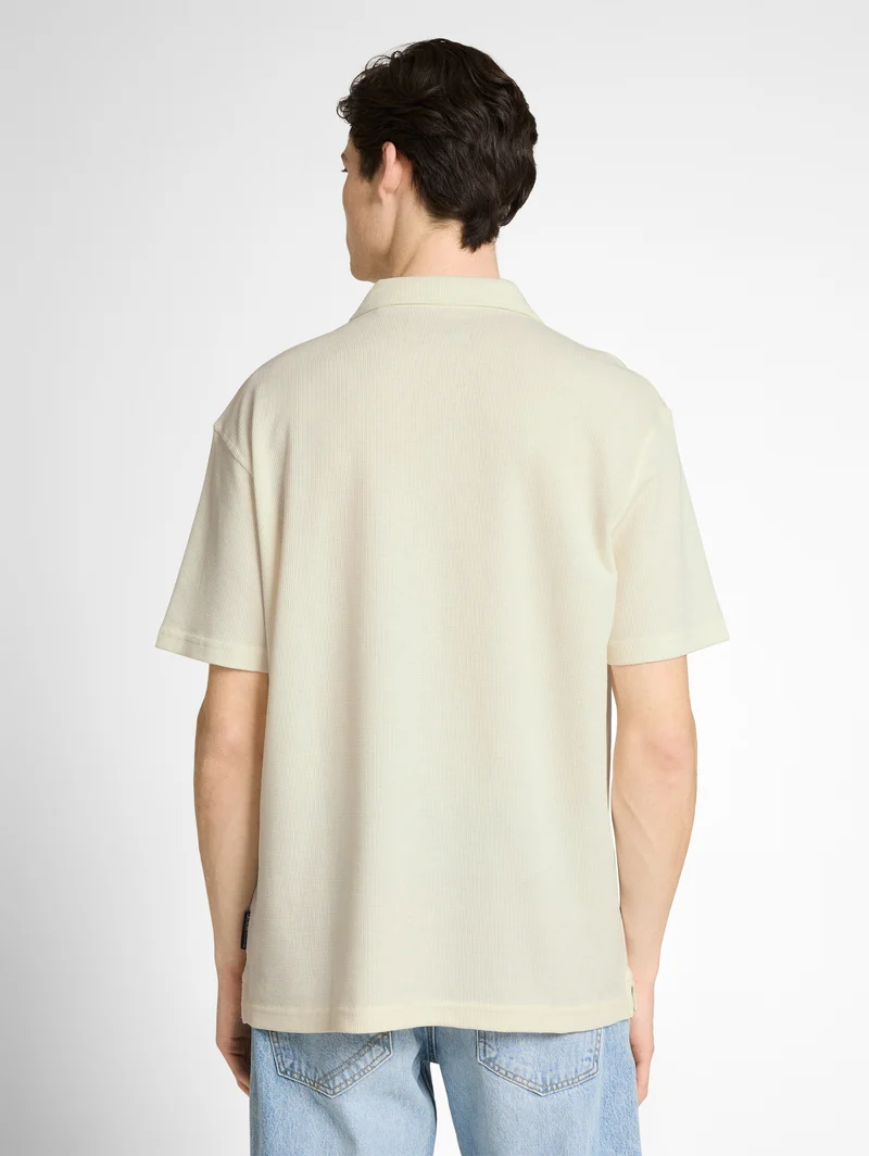 Relaxed Fit Resort Poloshirt mit Waffelstruktur