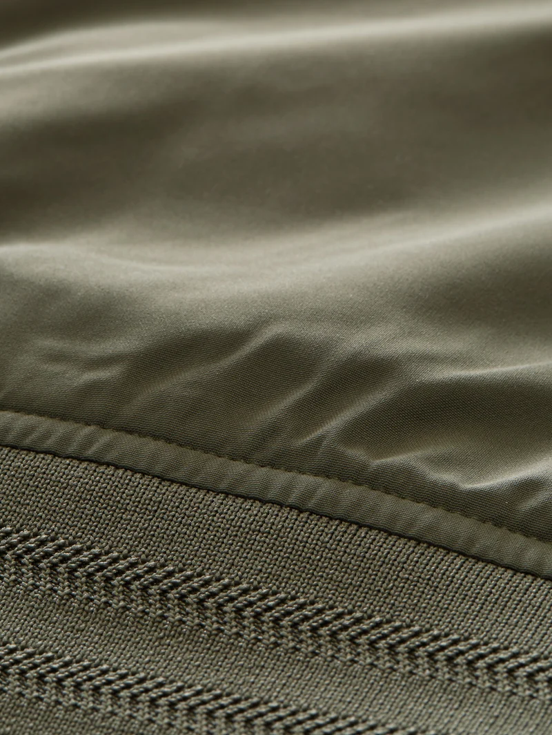 Blouson Jacke mit verstaubarer Kapuze
